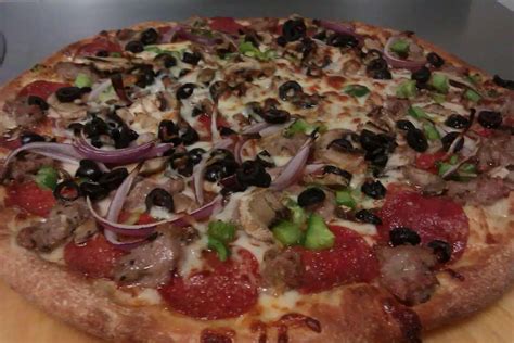 Specialties A Fresh wood fired pizza is made quick but oh so perfect Our wood burning oven, dough and select ingredients are just a few reasons why youll become a Bigaholic Dine in available where friendly service is a must. . Best pizza willoughby